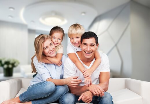 Positive couple of parents and cute kids at home, AI generated image