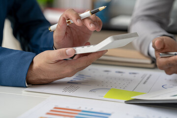 accountant or banker calculating or checking balance. Bookkeeper or financial inspector making...