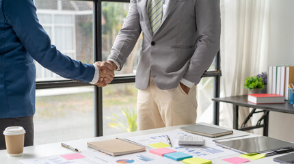 business adviser meeting to analyze and discuss the situation on the financial report in the meeting room.Investment Consultant, Financial advisor and accounting concept	