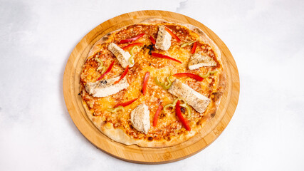 Spicy chicken pizza isolated