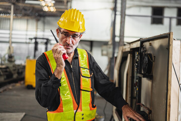 Engineers use radio communications to coordinate with employees in industrial