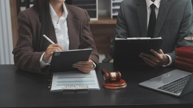 Lawyer explaining legal situation businessperson asian people working in b2b interview, networking or law firm agreement, Infringement of copyright, Embezzlement, Donee, Liquidator, Defunct Company.