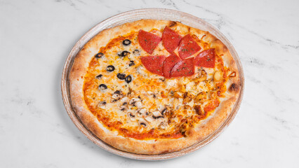 Pizza with mushrooms, olives and sausages 
