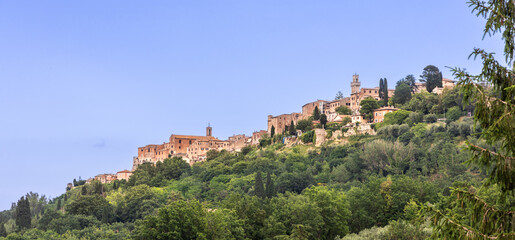 Fototapeta na wymiar Cityscape of Montepulciano, ancient city in Tuscany, Italy, on high ground with scenic greeneries and is popular tourism landmark.