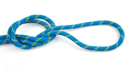 durable colored rope for climbing equipment on a white background. knot of braided cable. item for...