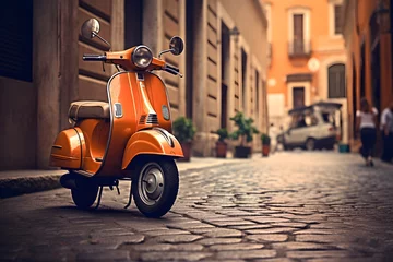 Fotobehang Scooter an orange scooter parked on a stone street