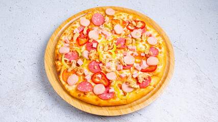 Vegetables and sausages pizza