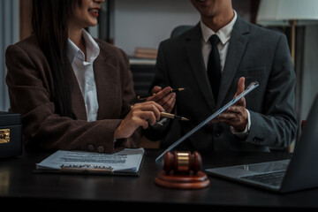 Lawyer explaining legal situation businessperson asian people working in b2b interview, networking or law firm agreement, Infringement of copyright, Embezzlement, Donee, Liquidator, Defunct Company.