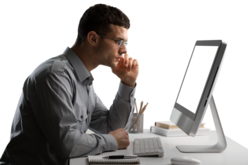 Young Caucasian man worker speak in glasses look at computer operational problems. Frustrated man surprised by unexpected error on computer device.
