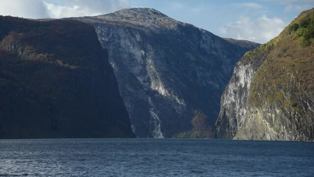 View from an electrical cruise ship on Sognefjord,  Aurlandsfjord Flam, Norway. Impressive mountain landscape of fjords and blue water