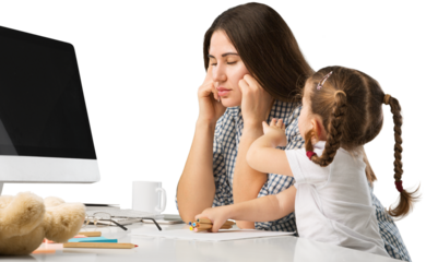 Happy busy mother working with a child on laptop