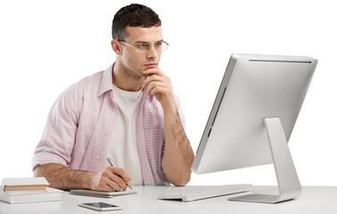 Young serious professional businessman focused student working on laptop, remote studying