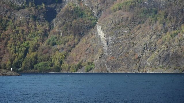 View from an electrical cruise ship on Sognefjord,  Aurlandsfjord Flam, Norway. Impressive mountain landscape of fjords and blue water