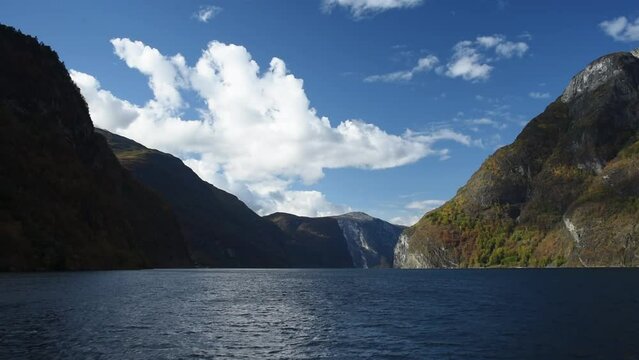 View from an electrical cruise ship on Sognefjord,  Aurlandsfjord Flam, Norway. Impressive mountain landscape of fjords and blue water