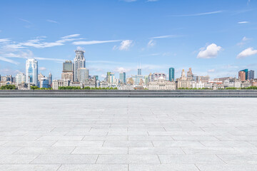 Empty square road and city skyline in Shanghai, China