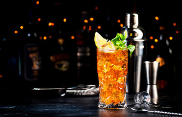 Boston tea alcoholic cocktail drink with white rum, dry gin, vodka, tequila, liquor, lemon juice,...