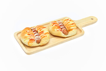 bread  stuffed with sausage and hot-dog  pork in wood plate on white background closeup,isolated