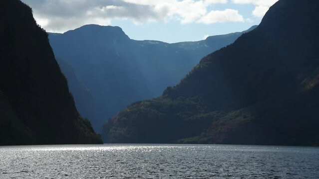View from an electrical cruise ship on Sognefjord,  Aurlandsfjord Flam, Norway. Impressive mountain landscape of fjords and blue water