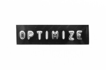 Black color banner that have embossed letter with word optimize on white paper background