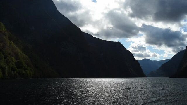 View from an electrical cruise ship on Sognefjord,  Aurlandsfjord Flam, Norway. Impressive mountain landscape of fjords and blue water