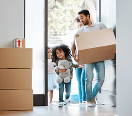 Happy family, box and moving in new home for real estate, property investment or mortgage loan by door. Father, mother and children walk in house with package for relocation, renovation or start life