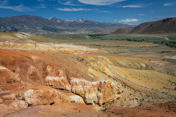 Fototapeta premium Kyzyl-Chin tract, Altai Mars. Picturesque canyon with mountains of different colors: red, yellow, orange, white. 