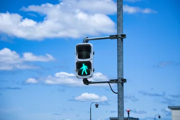 Foto op Canvas 青空と交通ルールの道路信号 © n.s.d