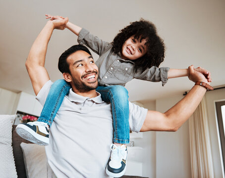 Love, Airplane And Father And Boy Child In A Living Room For Piggyback, Bond And Fun In Their Home. Happy, Flying And Kid With Parent In Lounge Playing, Flying And Enjoy Shoulder Game On The Weekend