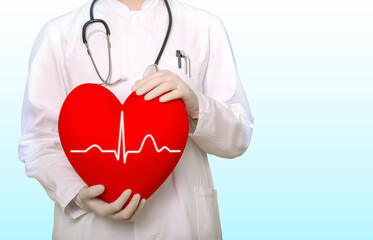cardiovascular diseae, doctor with stethoscope holding heart shape with ekg line in gloved hands, blue background