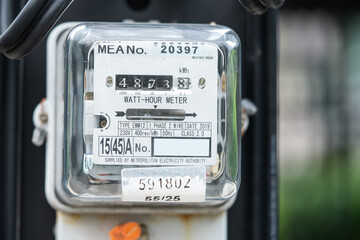 Bangkok, Thailand April 10, 2023,Electric measuring power meter for energy cost at home and office.