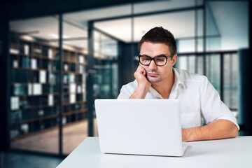 Fototapeta premium Young male doctor work on laptop computer, AI generated image