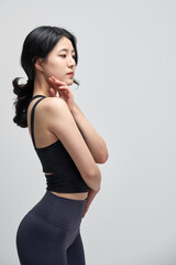 Fototapeta premium beautiful Asian woman exercising indoors
