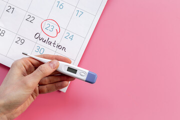 Ovulation day marked on calendar for pregnancy planning
