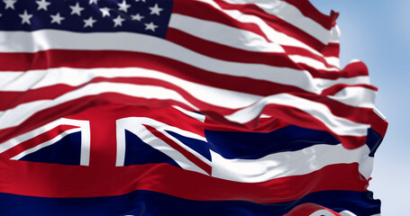Hawaii state flag waving with the national flag of the United States of America