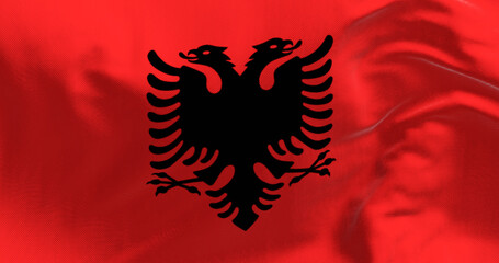 Close-up of the Albanian national flag waving