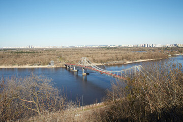 Top view to Kyiv city from Pedestrian and bicycle bridge across Saint Volodymyr descent in Kyiv, Ukraine