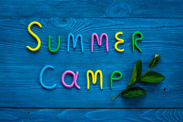 Fototapeta na wymiar Funny camping kids background. Summer Camp made of color clay