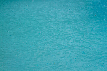 Raindrops on tropical aqua waters