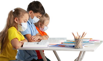 Children reading books sitting for table