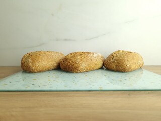 Wholemeal buns on table