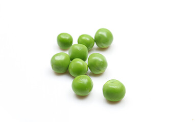 Group of fresh green peas isolated on white background