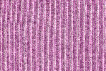 Natural linen texture as background. Cotton fabric with pink and white line striped pattern, texture close up. Backdrop, wallpaper. Matereal for clothes, curtain and upholstery