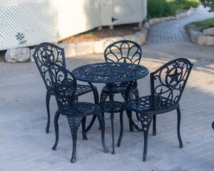 Plakat outdoor setting of table and chairs