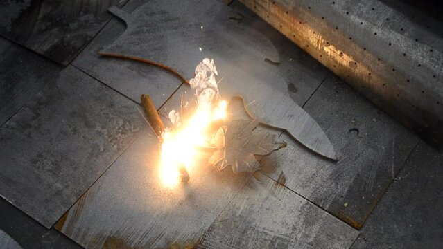 Laser cleaning of metal. Industrial laser cleaning rust of metal. Industrial removal of rust of metal surface with laser beam. Man cleaning surface from corrosion with laser metal cleaning machine