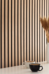 Espresso coffee on the table and wood wall background