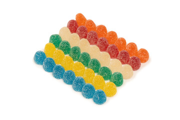 Assorted colorful gummy candies isolated on a white background.