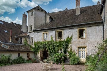 Fototapeta na wymiar Autun, medieval city in Burgundy, beautiful house in the center, with traditional glazed tiles 