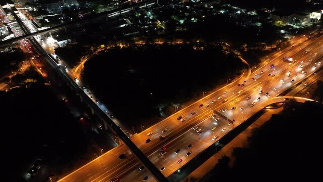 Expressway top view, Road traffic an important infrastructure, car traffic transportation above intersection road in city night sky aerial view cityscape of advanced innovation, financial technology	