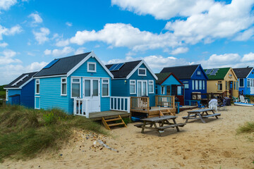 Hengistbury Head, UK - July 1st 2023: Beach huts on Mudeford Sandbank.