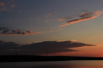 A sunset over a body of water
